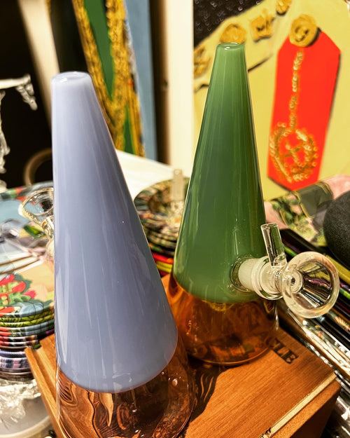 Ripkitty 7" 2-toned cone showerhead water pipe bong in slate blue and forest green colorways with amber base and clear glass bowl — side-by-side display
