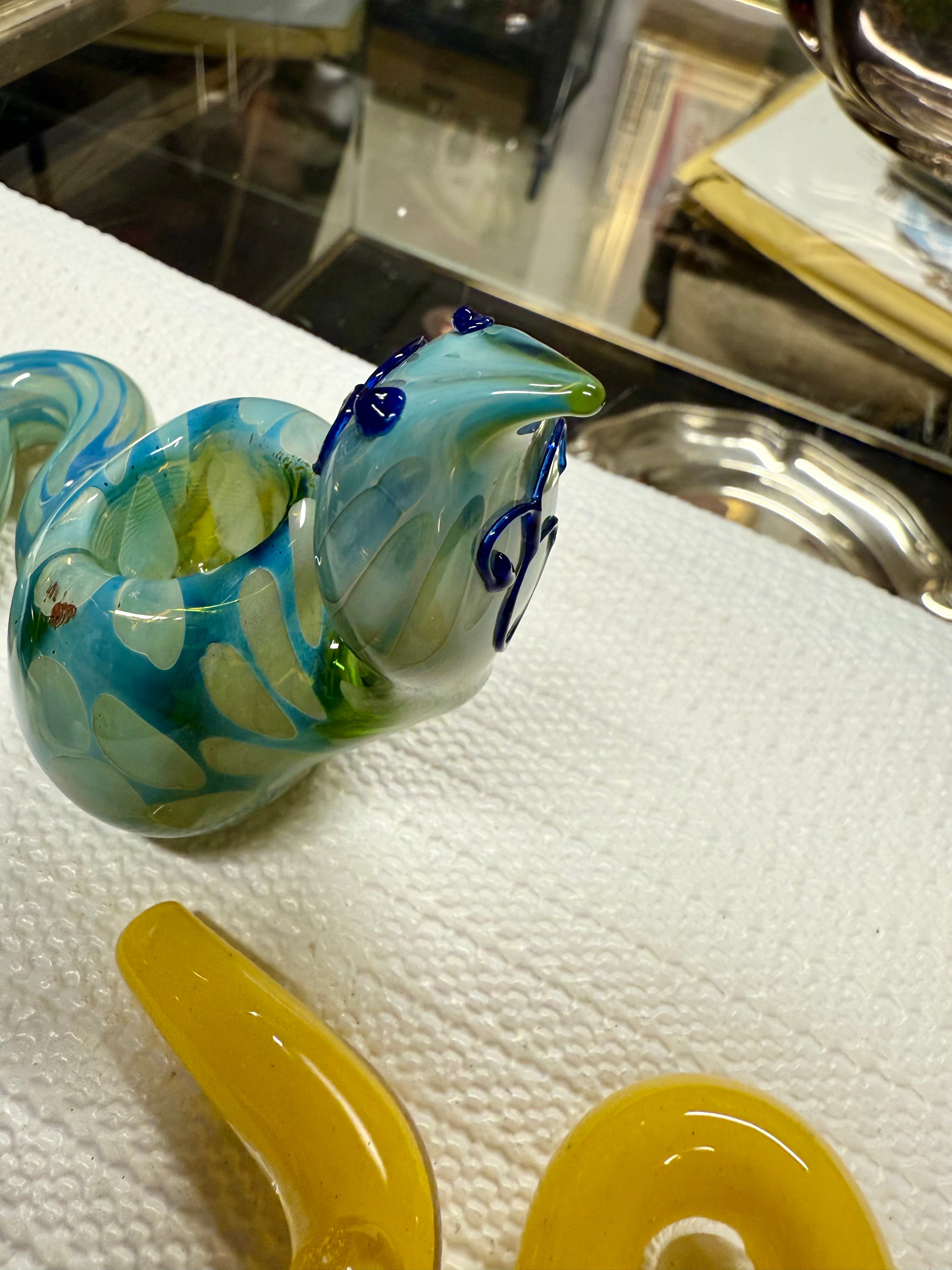Top-down view of Ripkitty 5" COBRA borosilicate glass pipe — cobra head bowl and coiled neck detail, blue & green assorted colorway