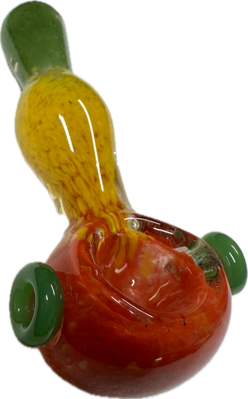 Side angle of Ripkitty rasta spoon pipe on white background — full pipe profile showing green mouthpiece, yellow frit stem, red bowl, and green marble side accents